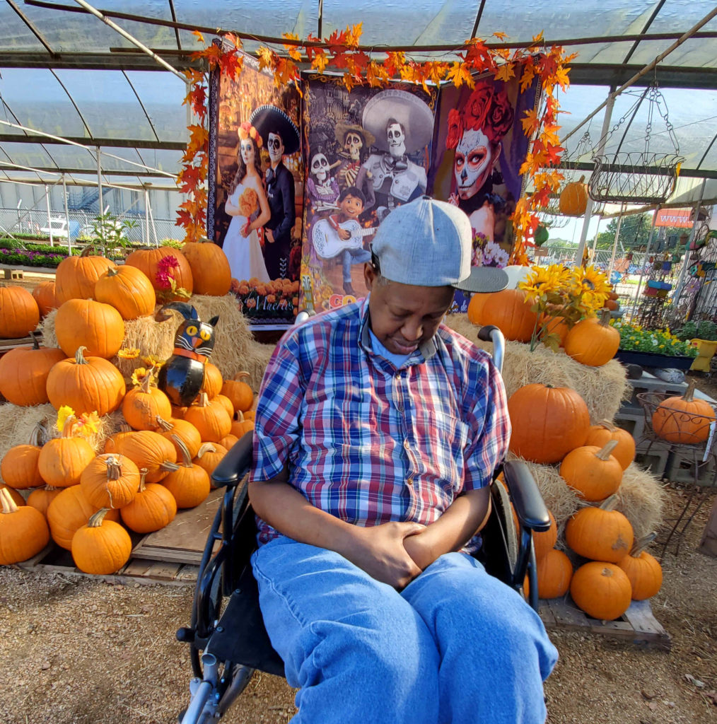 Customer with pumpkins and hay bales!