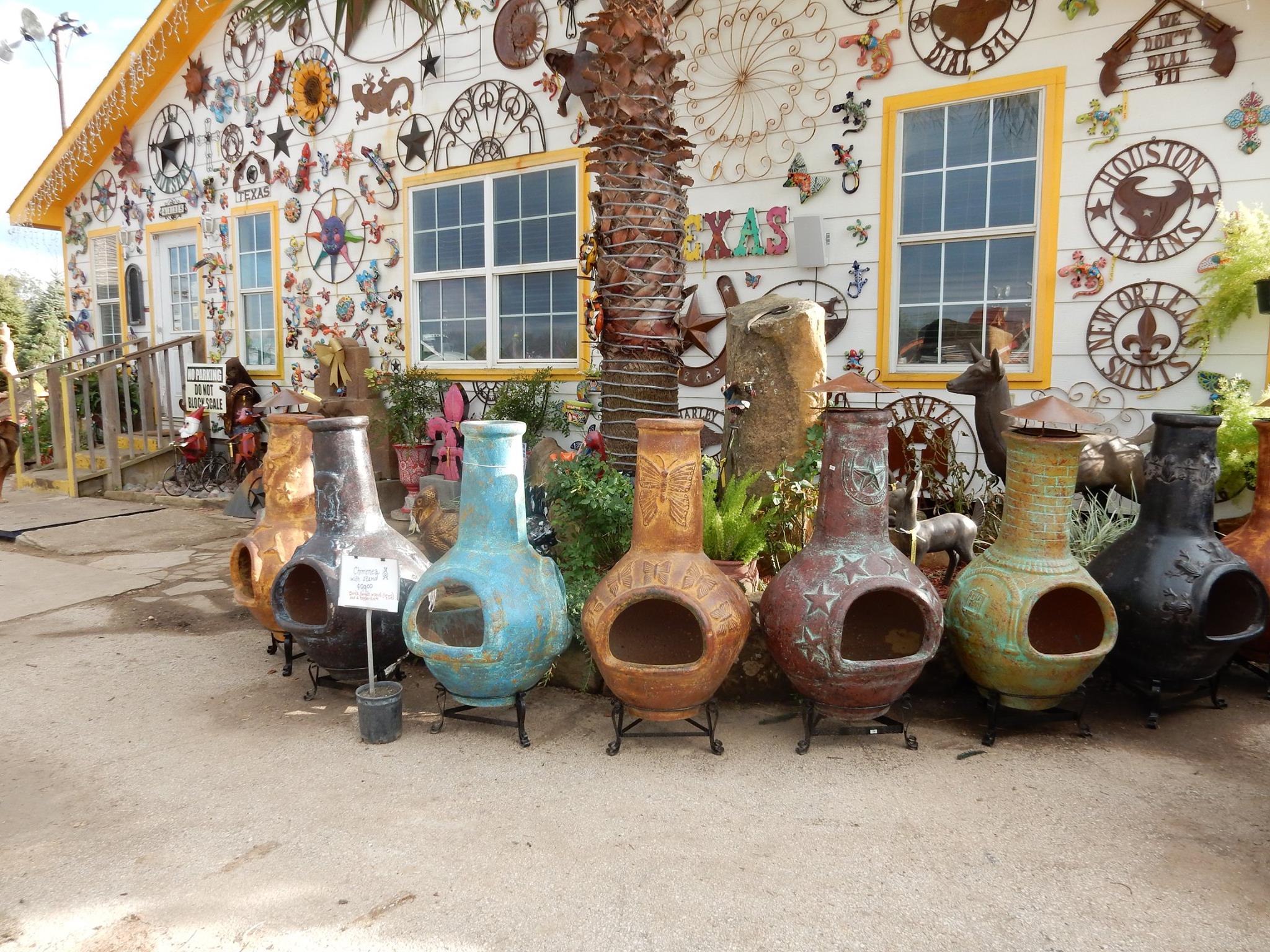 Yard decorations like pottery and metal decorations at Madison Gardens Nursery, Spring, TX.